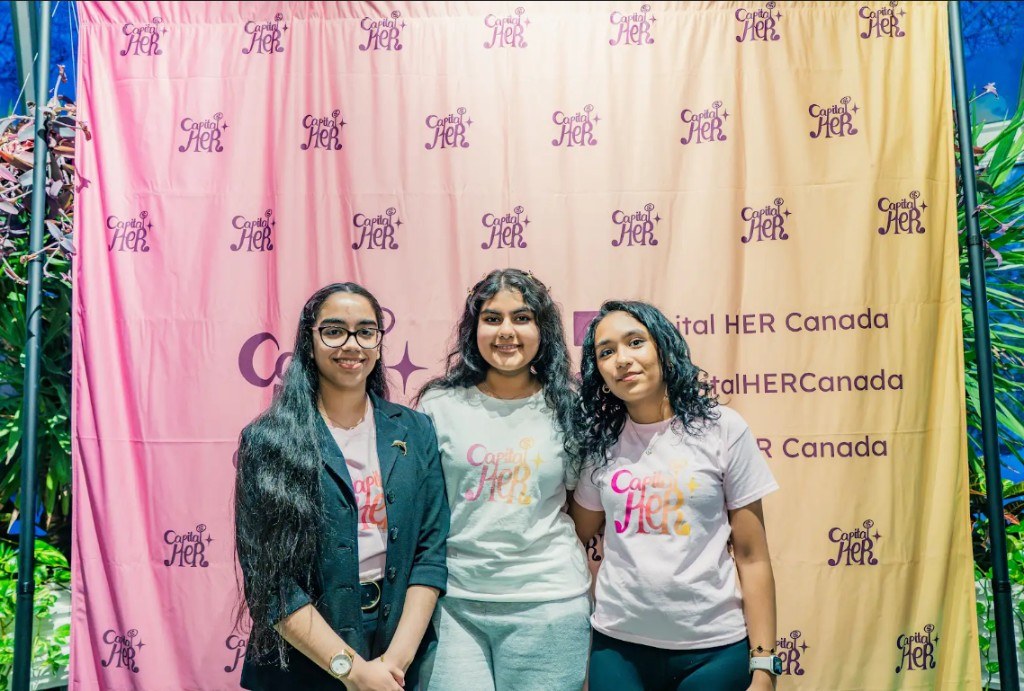 CapitalHER team at a community event